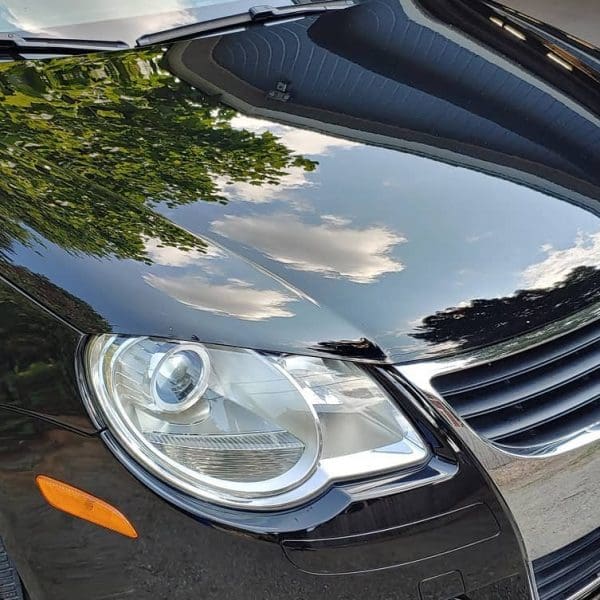 Black Car with Silica Paint Sealant Black Car with Silica Paint Sealant