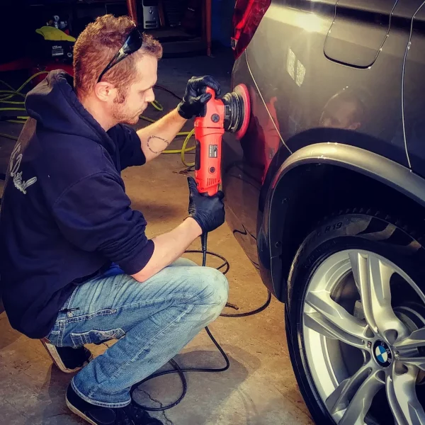 Jesse Machine Polishing a Car